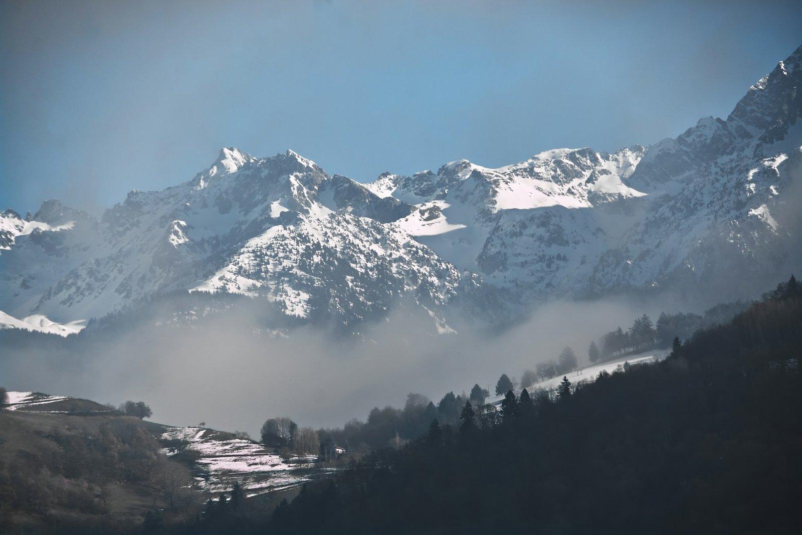 snow caped mountains in winter in switzerland